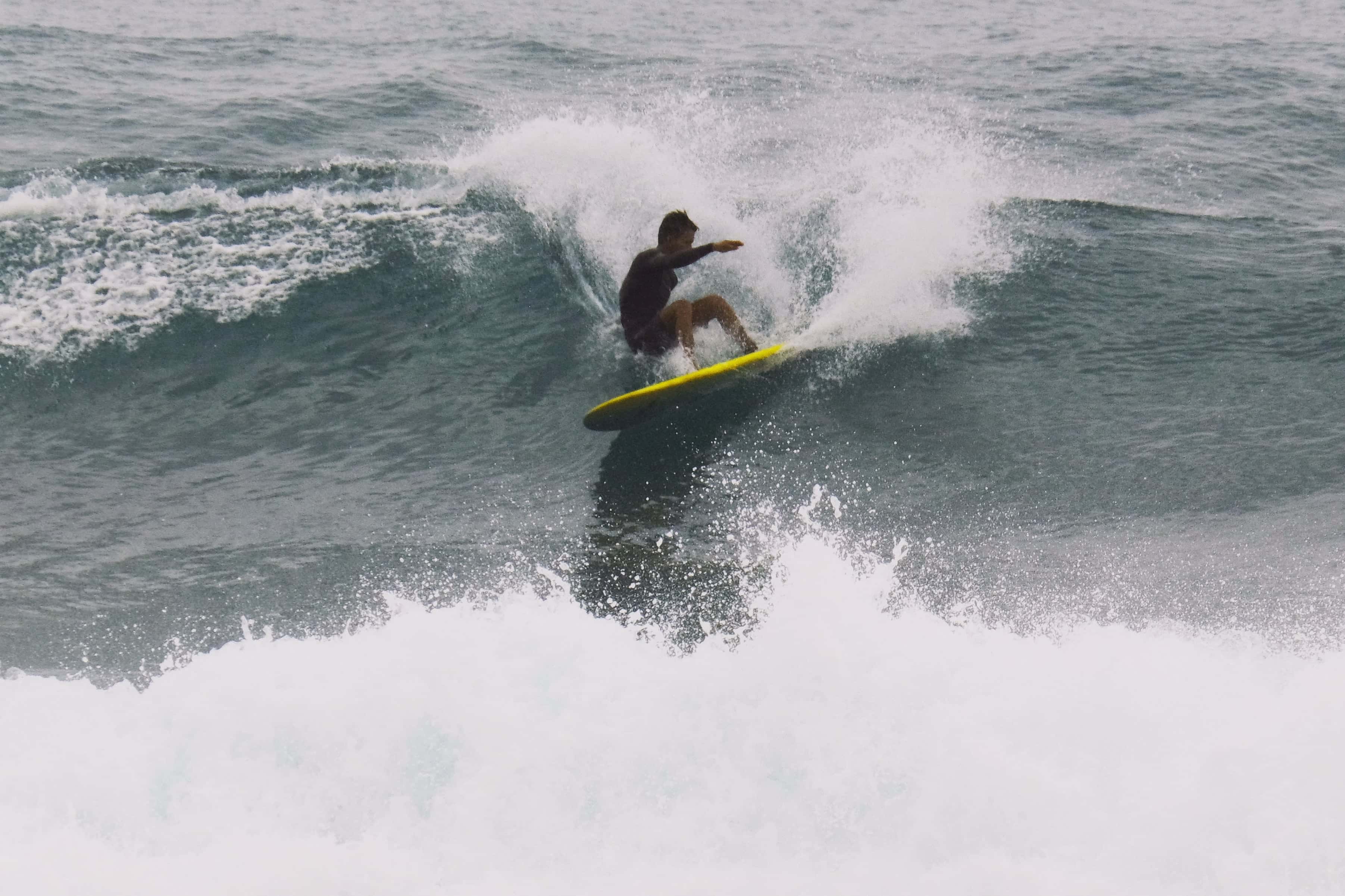 Surfing at Balangan beach